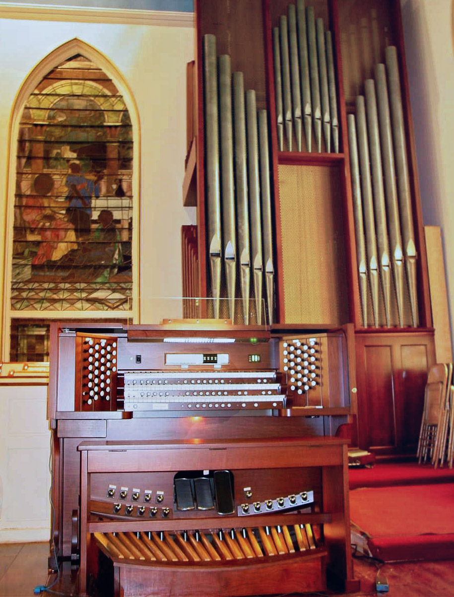 FIRST CONGREGATIONAL CHURCH, SUTTON, MA - THREE MANUAL Allen/Wicks 55 stop 62 ranks 3 manual drawknob organ. The First Congregational Church of Sutton, MA is an active and growing UCC congregation. The church owned a Wicks 11 stop 13 rank neo-baroque 2 manual console and they sought a broader specification to accompany its active and growing choir. The choir presents a wide range of repertoire and needed an organ that had a broader tonal palette and MIDI capabilities. Space is limited in this historic church and a larger pipe organ was not feasible. The church selected an Allen Organ 3 manual Renaissance organ. We found that the pipes could be revoiced to create a broader tone with a softer speech characteristic. The Allen Organ specification was in turn custom designed on site to create an ideal blend of voices. A Vista Navigator MIDI module was added in 2013. The organ was dedicated by Diane Bish.